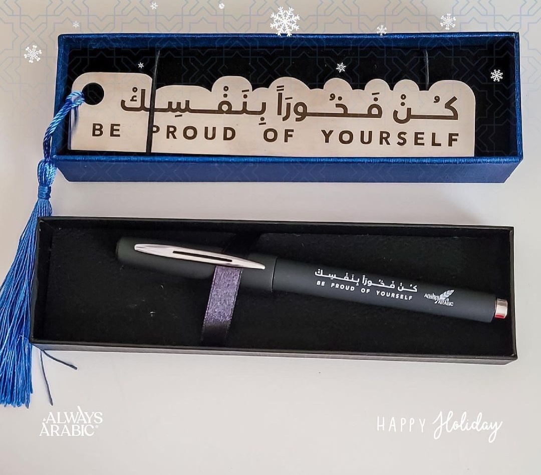 A pen and a bookmark in a case. Both of them read 